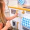 KidKraft Simply Stylish Wooden Play Kitchen Set with Lights, Choppable Food & Accessories